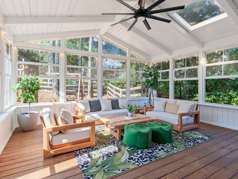 Luxury backyard outdoor living space with pool and patio
